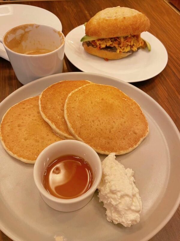 pancakes and breakfast sandwich
